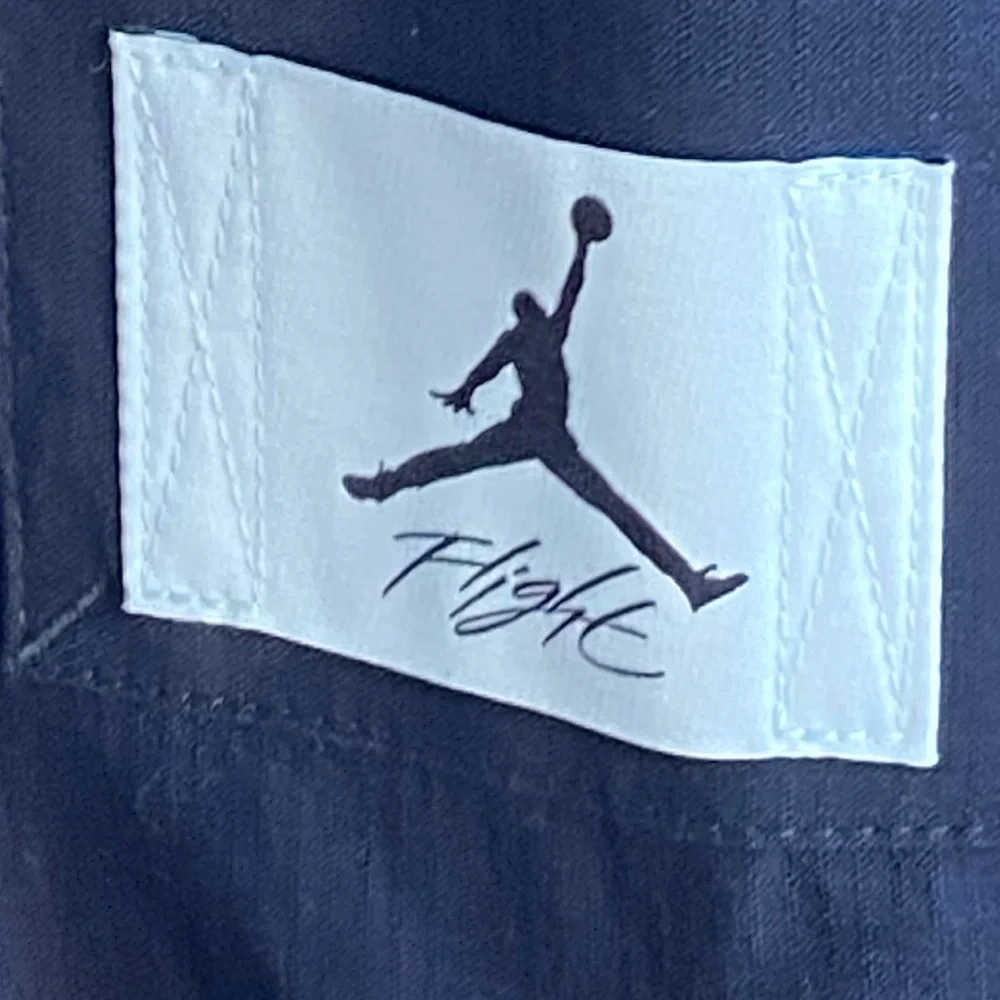 New Jordan Men’s Black Cargo Pants with Logo Patch
